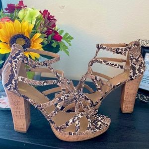 Size 11 women’s snake skin sandal heels, never been worn